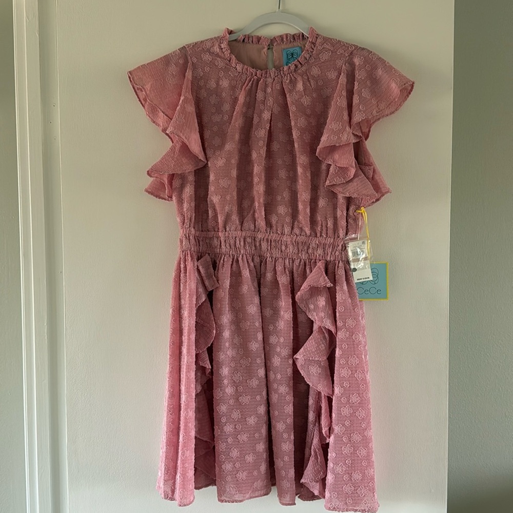 Brand new dress with tags from Macy’s. Size 12